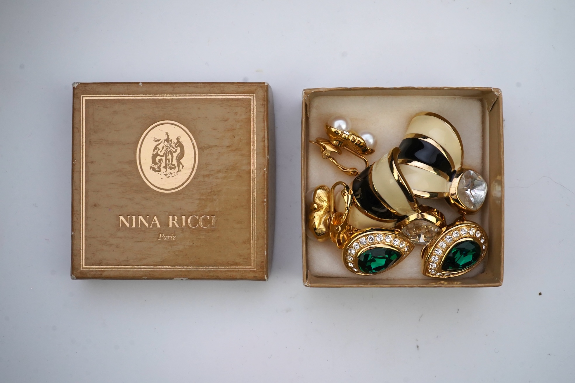 Two pairs of Givenchy clip earrings and four other pairs.